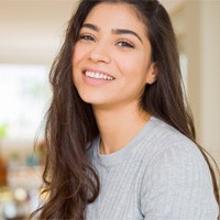 Woman with veneers in Bellevue smiling